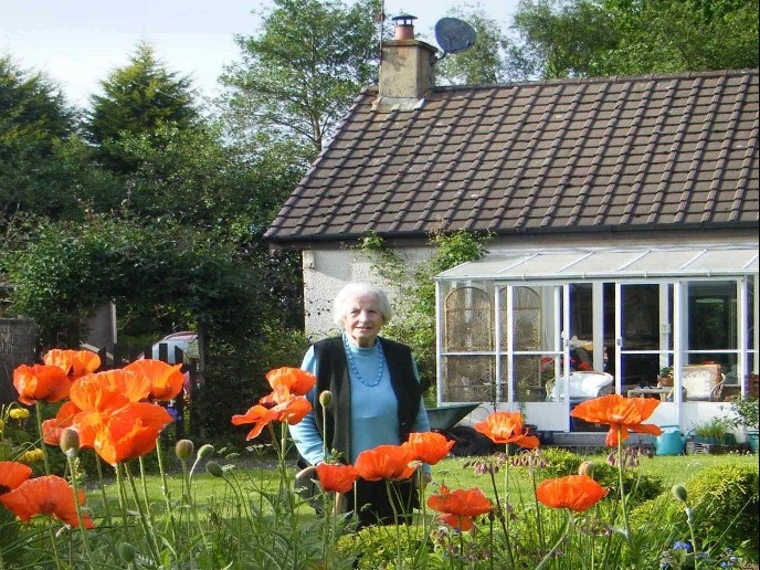 Jean in her garden at Millhouse
